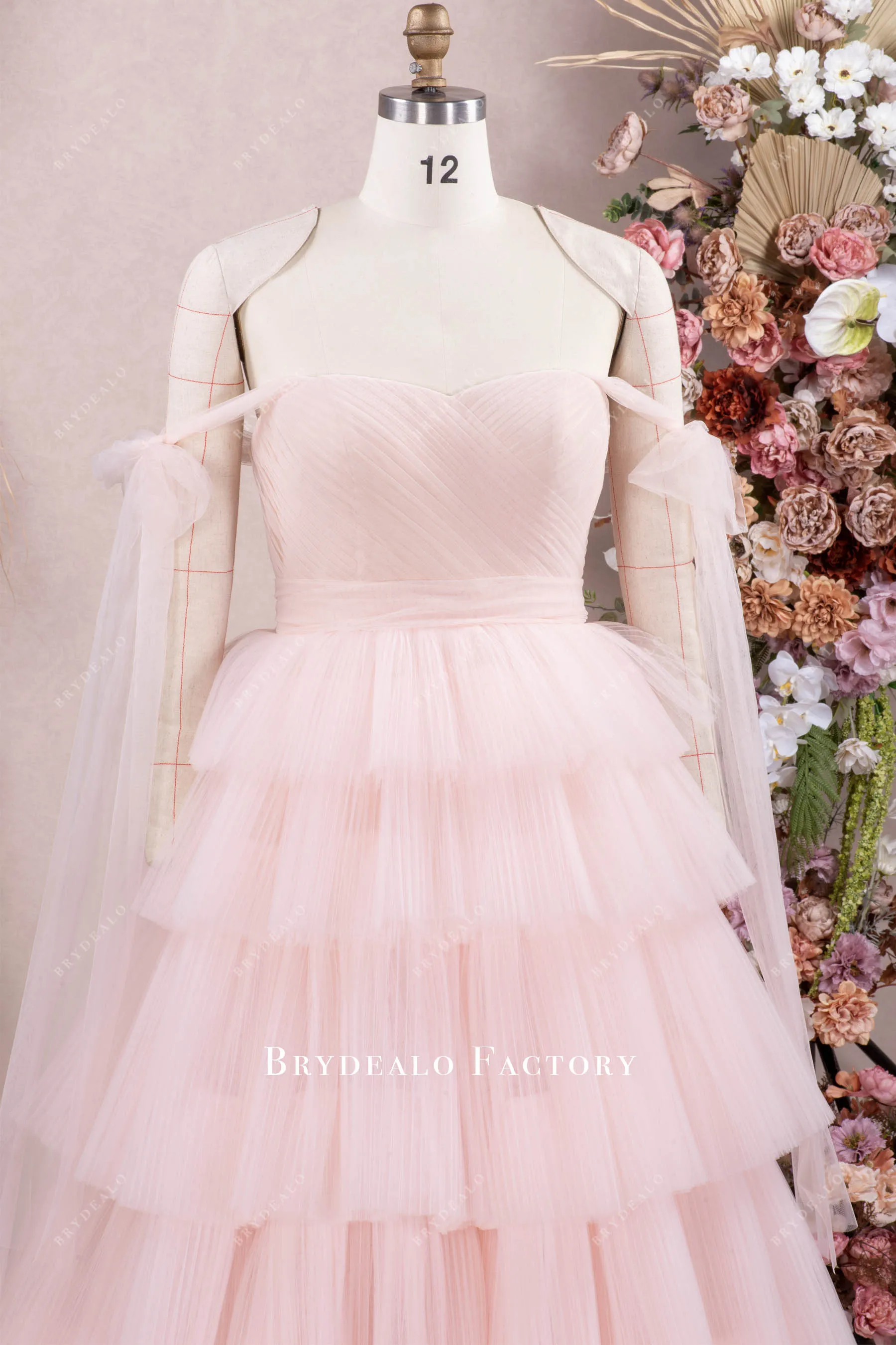 Blushing Pink Off Shoulder Tiered Tulle Wedding Gown